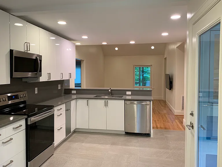 Kitchen looking out into living room