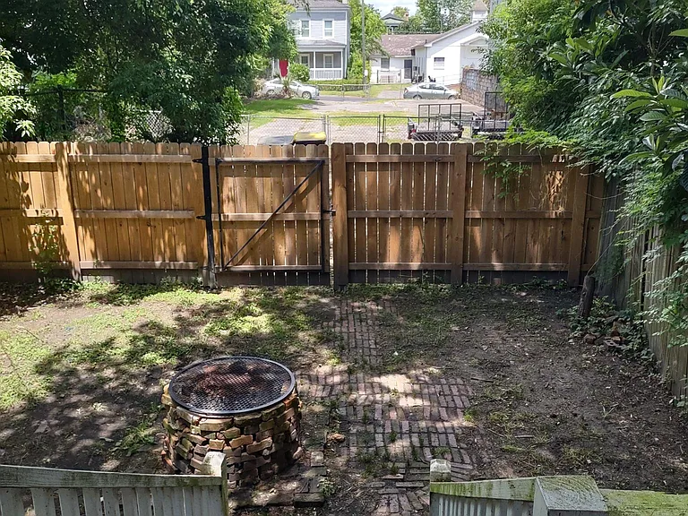 Fire pit and fenced back yard