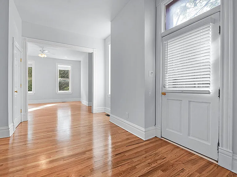 The Foyer, Looking towards the Living Room, Venetian blinds on all Windows