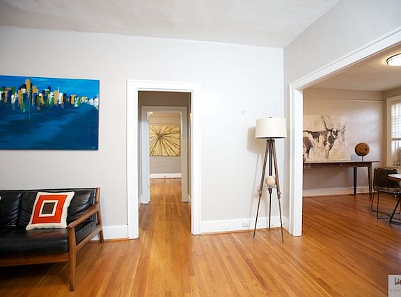Living room with adjacent dining room