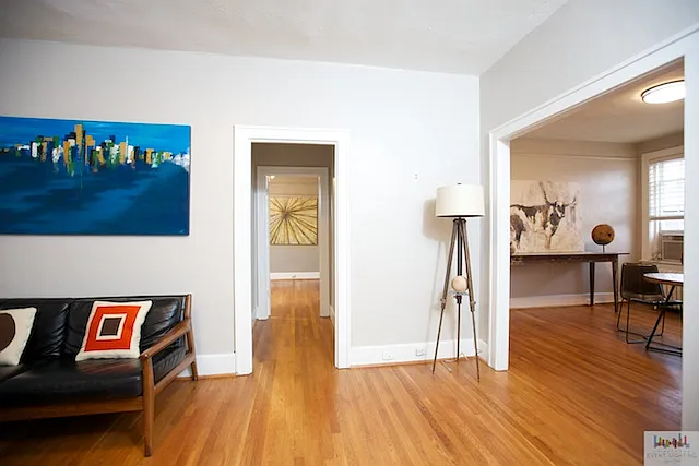 Living room with adjacent dining room