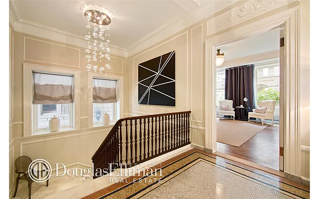 Sold by Douglas Elliman | media 13