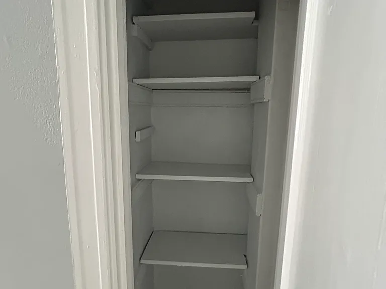 Kitchen closet storage on right