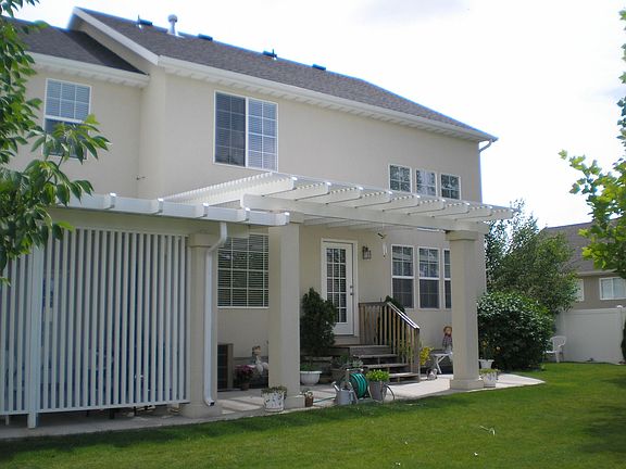 Back view with the covered patios