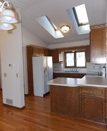 Nice sized kitchen with Gas Range, Skylights and Breakfast Bar