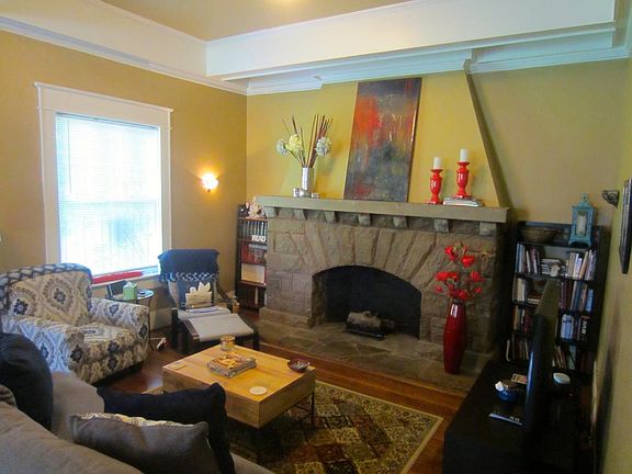 Living room with large fireplace