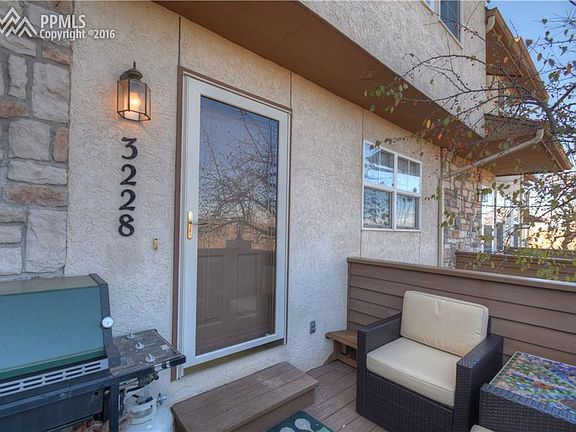 Front entry with room for outdoor furniture and BBQ grill