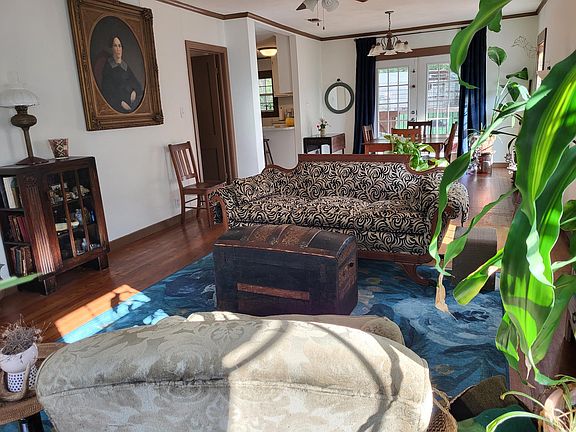 Living to dining with kitchen to left of dining.