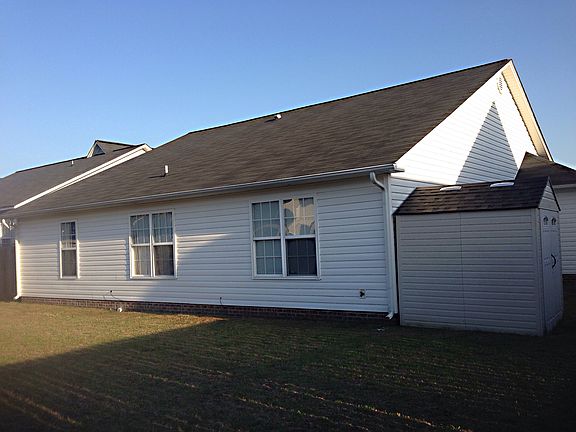 Back of house w/ Storage