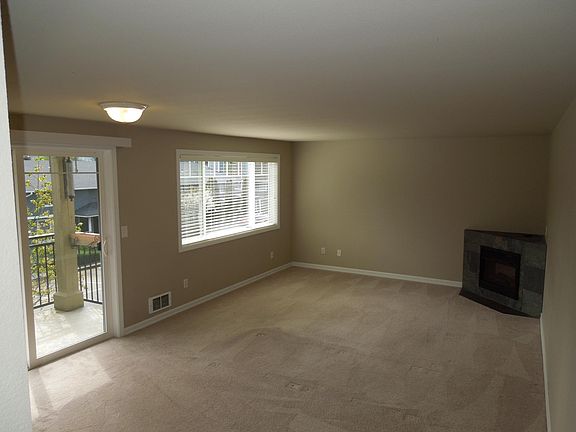Living Room w/ Electric Fireplace