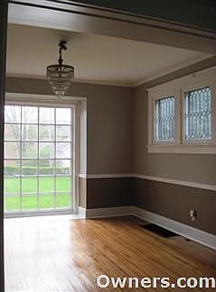 Dinning room. Featuring 1929 Chandellier and stained windows