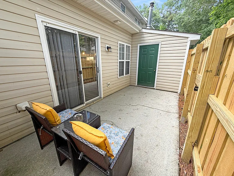 Private outdoor patio with locking storage closet
