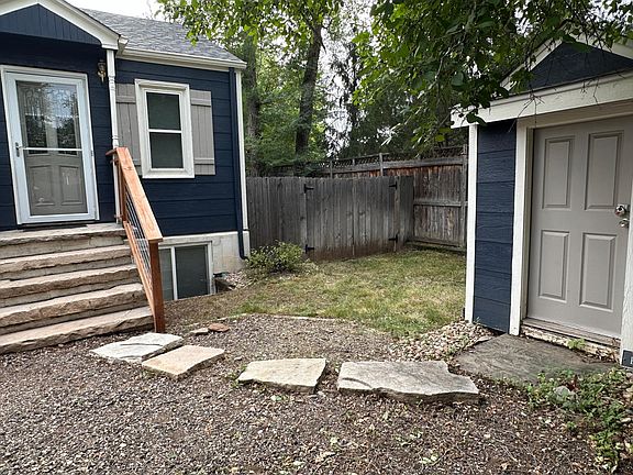 Front entrance and storage shed