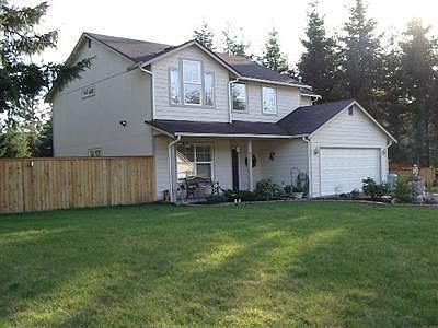 Front of 1 acre lot home with private gated entry into Lacamas Valley Estates