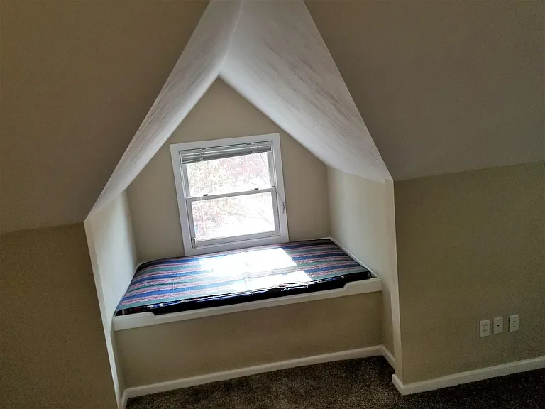 Cozy window seat. Great for a pet that loves the sunshine!