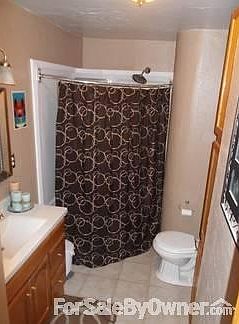 Bathroom
						:
						updated bathroom with jetted tub, tile floor and oak cabinets