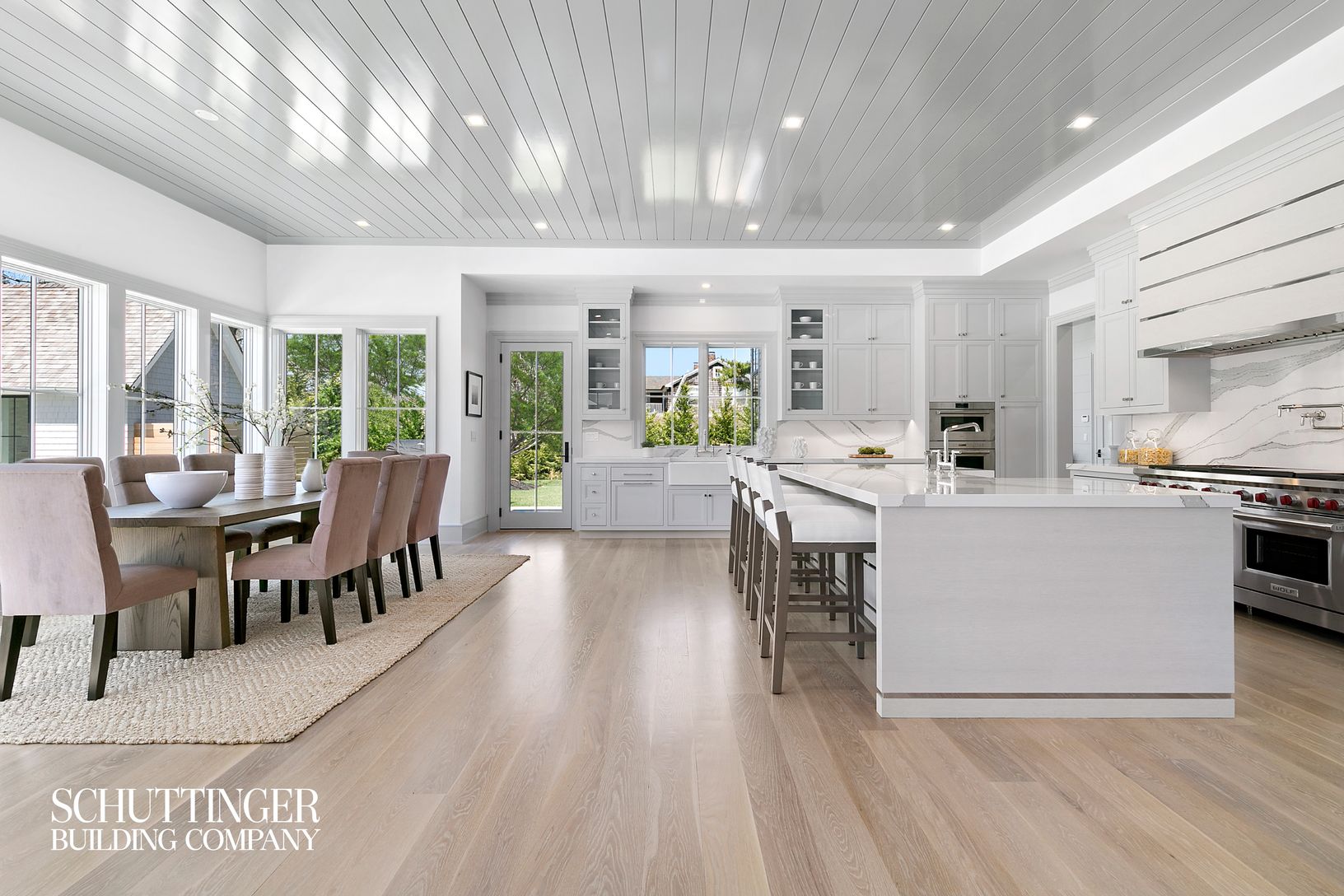  Gourmet Kitchen with Wolf and Sub Zero Appliances, Custom Cabinetry, Breakfast Area, and High Gloss