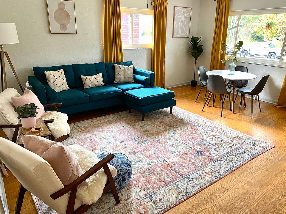 Lovely light and bright living room. Fully furnished seating area with Roku TV, and dining area