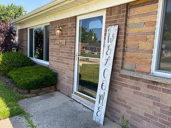 Charming brick ranch with mature landscaping