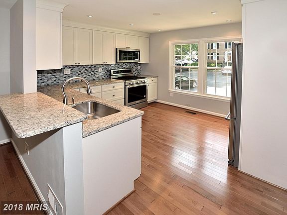 Open concept kitchen with breakfast bar