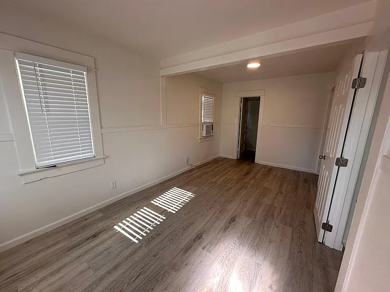 Front room looking to the back closet in corner