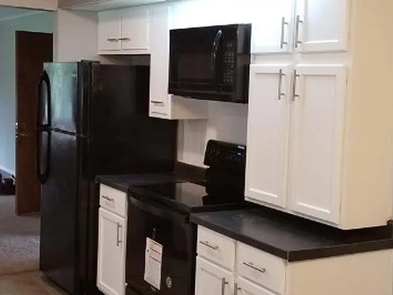 old photo kitchen prior to moving cabinet
