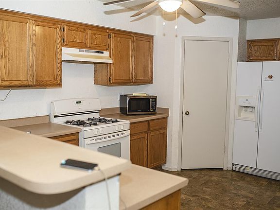 4th image of 8869 E 26th Pl