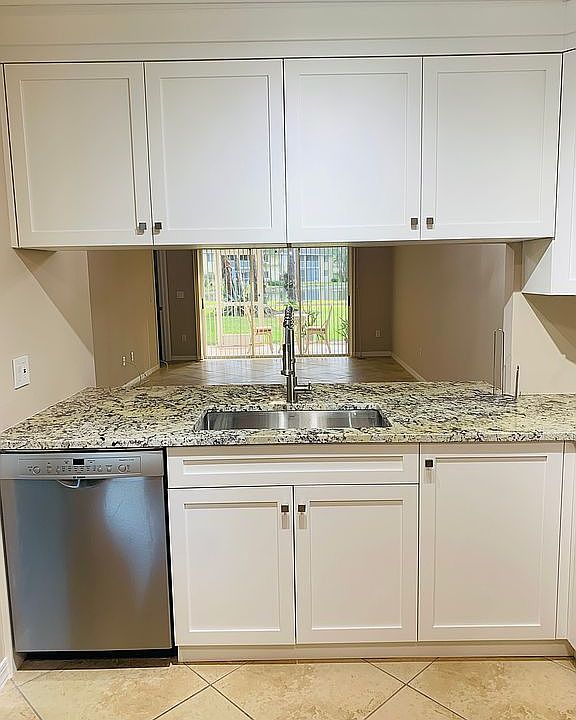 1st image of 5676 Woodmere Lake Cir #D104