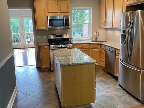 Kitchen with view into great room