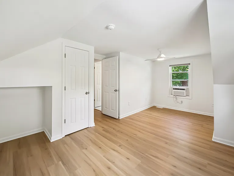 Upstairs Bedroom 1 (view of closet & door)