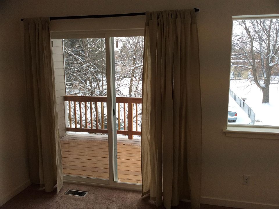 master bedroom with view out to redwood deck
