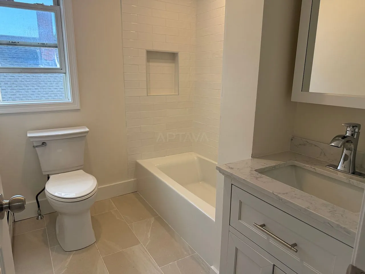 Sunny & Bright Renovated Top-Floor Unit | In-Unit Laundry — Photo 4
