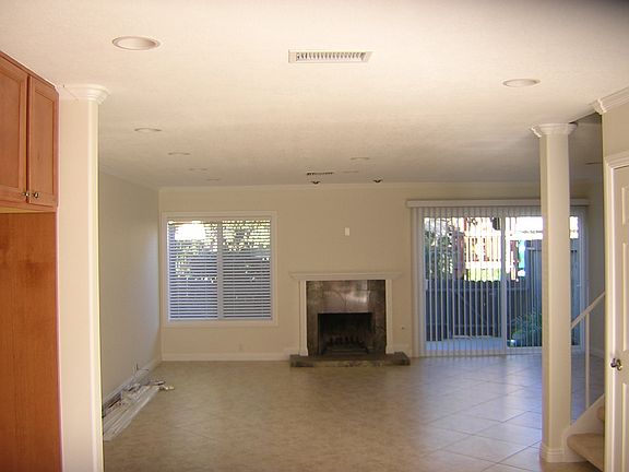 Living room 
from kitchen area out towards greenbelt.