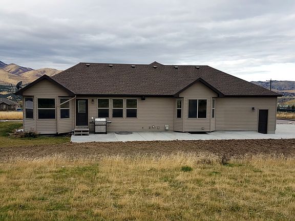 Yard has sod and fence 