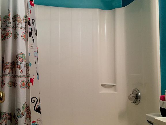 Downstairs bathroom with sundial shower head