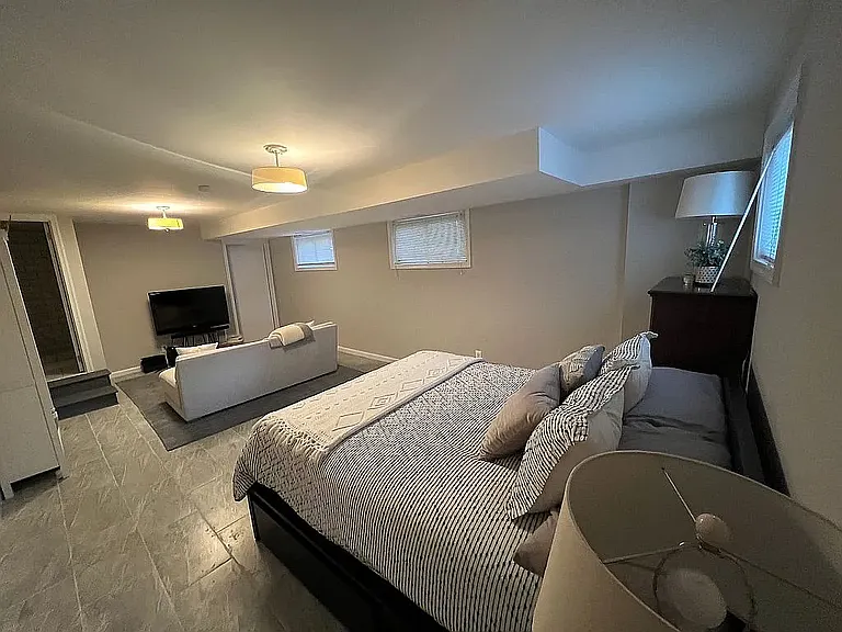 Lower level with separate bathroom and entrance to backyard.