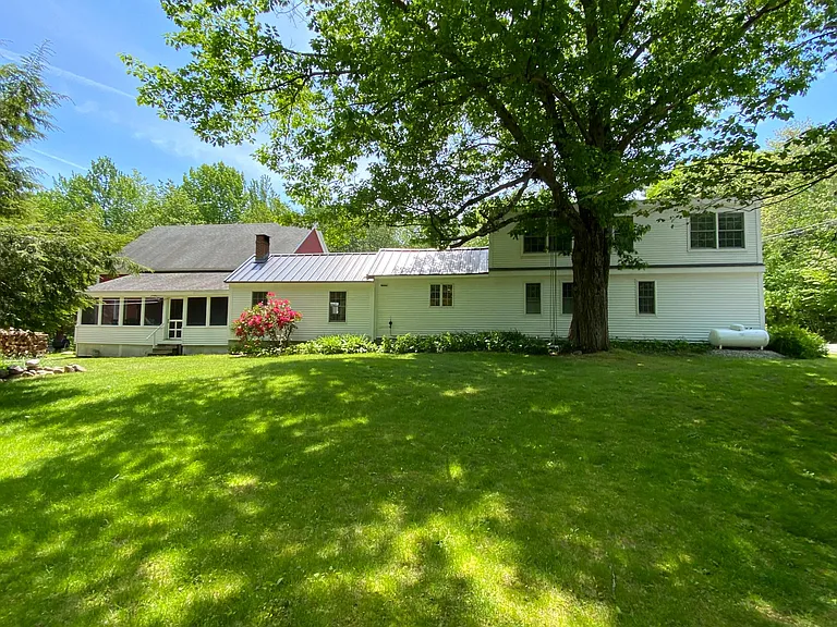 Left to right of side yard: screened porch, kitchen, first floor bath, one of first floor bedrooms. Upstairs: two bedrooms with a bath in the middle
