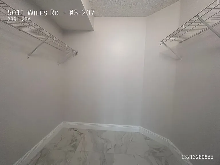 5011 Wiles Rd #3-207 — Photo 6