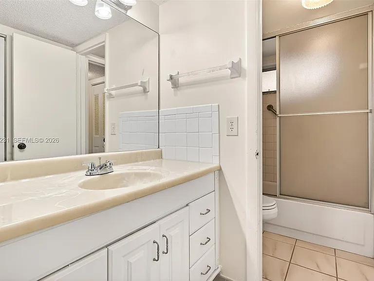 5801 NW 62nd Ave #106 — Photo 13