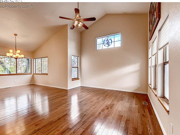 Vaulted ceilings with gleaming wood floors