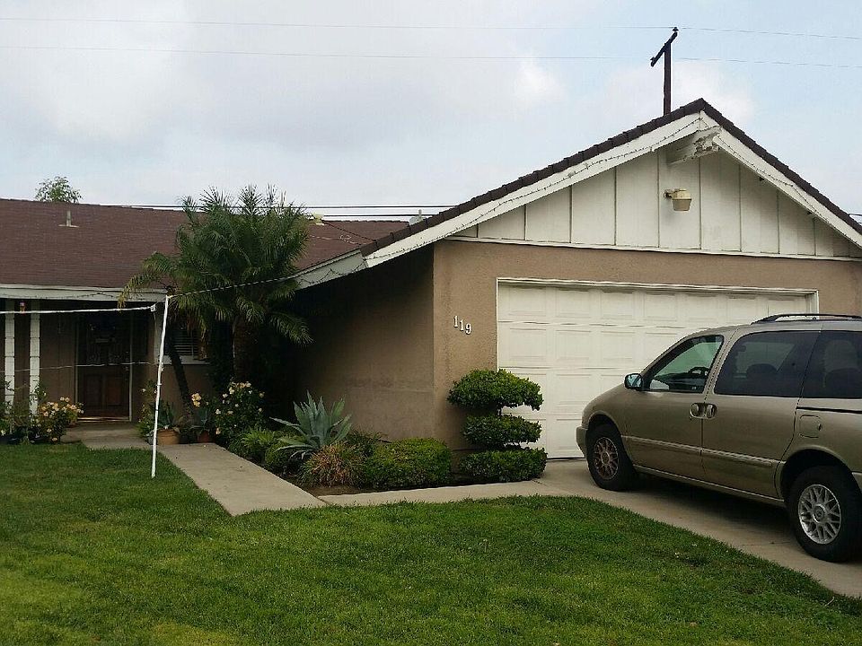 Front Left side with Garage