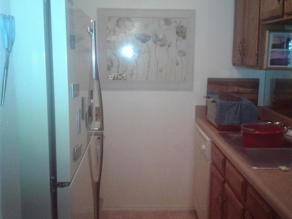 Kitchen- refrigerator, oven, microwave, toaster oven, disposal, trash compactor