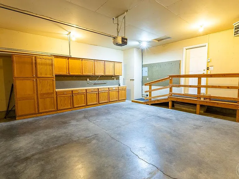 Heated 2 car garage with abundant storage