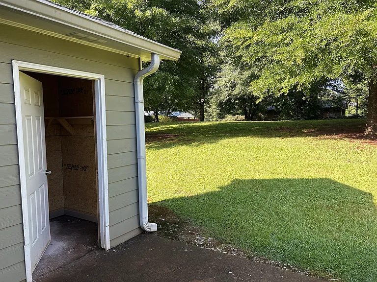 Patio, yard, and storage shed