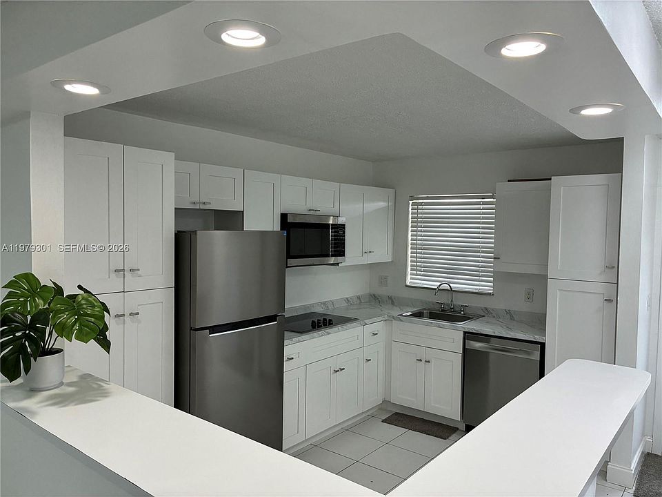 1st image of 609 S State Road 7 APT 2C