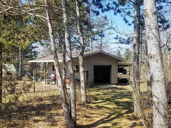 Additional Gar Storage Space Plus fenced in Garden area w/Water