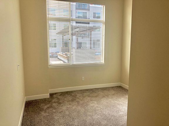 Bedroom w/ walk-in closet. Fits King Size bed.