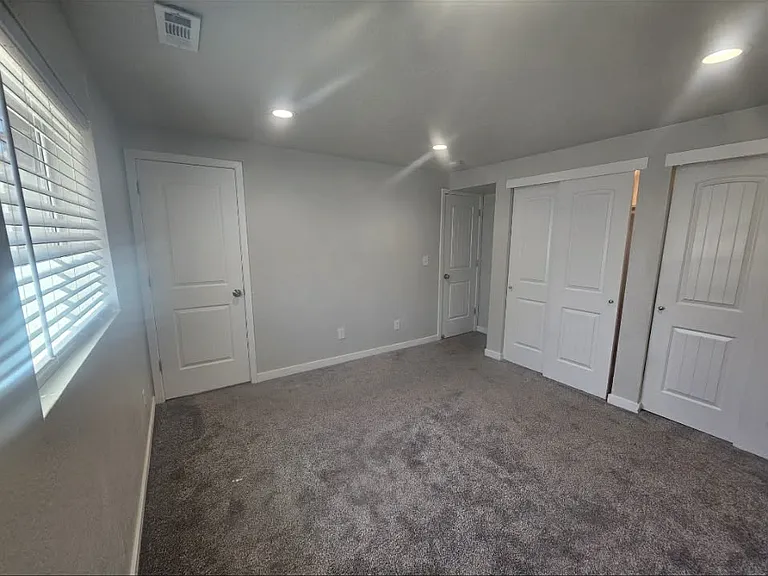 Master bedroom with full bath and spacious closet.