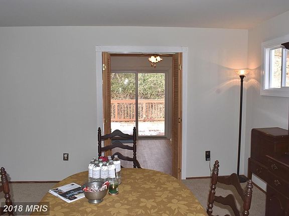 Dining Room with view of backyard through kitchen