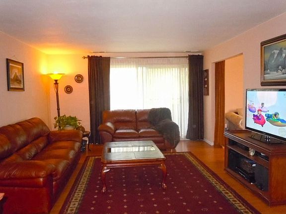 Lovely Living Room with Large Windows